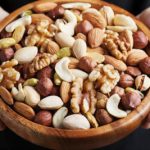 What are the health benefit of eating nuts regularly?