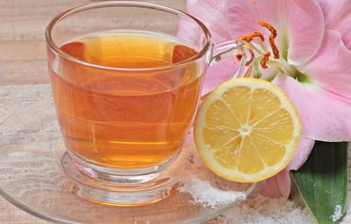 Is it healthy to consume lemon water in an empty tummy?