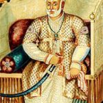 What is the history of the Travancore-Mughal conflict?