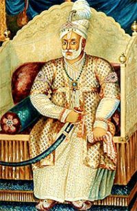 What is the history of the Travancore-Mughal conflict?