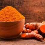 With what should turmeric not be consumed?