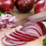 eating lots of raw onions with salad beneficial to health?